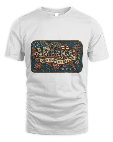 A white short-sleeve crewneck t-shirt featuring a vintage-style patriotic graphic on the chest that reads 'AMERICA 250 YEARS OF FREEDOM TEXAS 1776-2026' with an eagle, map, and distressed blue background.